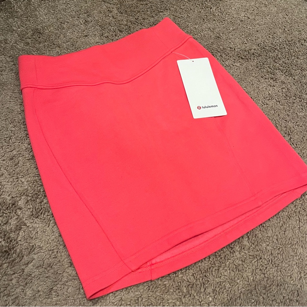 New scuba mini skirt. Beautiful pink color. New with tags